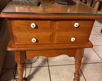 pair of maple end tables with glass tops