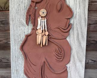 another large pottery figure to hang