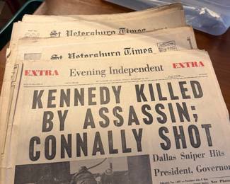 several newspapers from Kennedy assassination