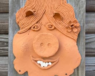 large pottery face for outside
