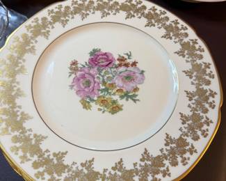 set of 12 china plates in excellent condition