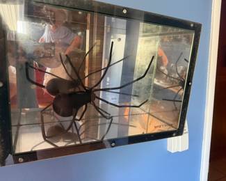 unique spider artwork made from a lightbulb