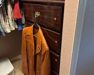 leather jacket and chest of drawers