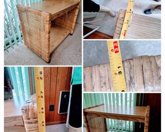 Woven rattan and wood two-tier rolling console with cane-style sides and casters $95