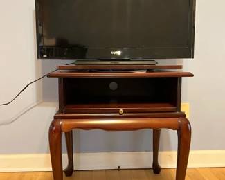 Cherry TV Stand, Sanyo TV, And Roku Stick