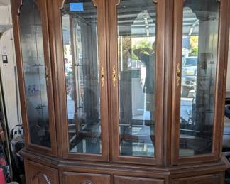 Solid Wood China Hutch: Beautiful solid maple traditional china hutch/display cabinet featuring curved glass doors, brass hardware, and massive storage capacity.  Comes in 2 sections.