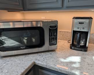 Kitchen Appliances: Sharp Carousel stainless steel microwave and Cuisinart programmable coffee maker.