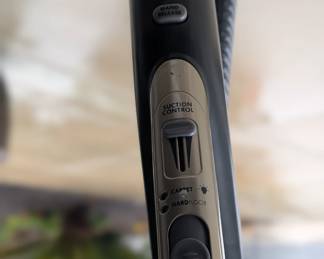 Kenmore Upright View: Full upright view of the Kenmore Elite HEPA canister vacuum, showing the wand, handle, and hose in excellent condition.