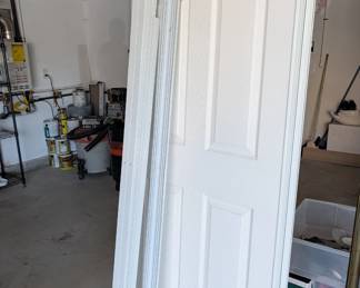 Home Improvement Supplies: Full-size white 6-panel interior closet bypass door (new) and various lengths of molding.