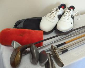 Golf Clubs And Shoes