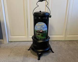 P70 - $30. Decorative Vintage Heater. Has lights inside to look like a fire. 