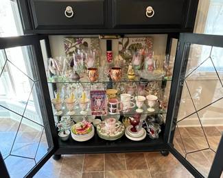 P22 - $275. Cute Display Cabinet / Storage Cabinet. Was used in the kitchen but very versatile piece! Measures 49.5” wide x 18” deep x 58.25” tall. Has 2 drawer that slide easily. Glass Shelves inside that are adjustable. 