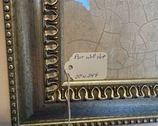 P17 - $15. Pair of Silver Framed Prints. Measures 20” wide x 24” tall. 