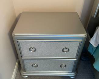 P13 - $50. Single Silver Nightstand in Very Good Condition. Measures 24“ wide x 16.5“ deep x 28“ tall.