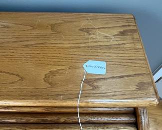 P83 - $150. Solid Wood Roll Top Desk. Measures 36" wide x 23" deep x 45.75" tall. Minor scratching on the top. Overall very good condition. 
