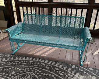 P7 - $375. Blue Glider Bench. Measures 64” wide x 28” deep x 32” tall. In Great Vintage Condition! No rust spots noted and glides very nice! Sturdy iron frame and woven seat & back. 