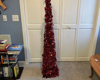 P72 - $20. Tall Red  Wiggle Tree. 