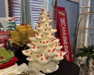 P73 - $50. Vintage White Ceramic Tree with Pink Ornaments. The top has a significant chip but if you place it towards the back it's not very noticeable. Star still stays in - See photo. 
