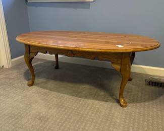 P65 - $40. Solid Wood Coffee Table.  Measures 46” wide x 28” deep x 16.5” tall.
