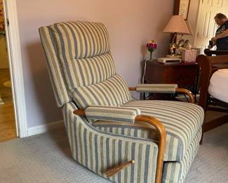 P19 - $40. Vintage Rocker / Recliner. Measures 29” wide x 31” deep x 36” tall.