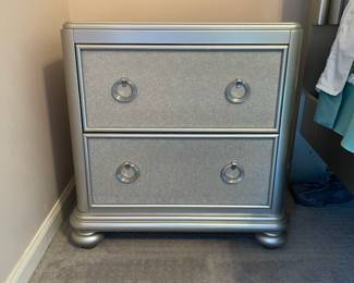 P13 - $50. Single Silver Nightstand in Very Good Condition. Measures 24“ wide x 16.5“ deep x 28“ tall.