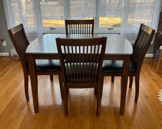 P84 - $125. Small Dining Table with 4 Chairs. Measures 48" x 36" x 30" tall. Chairs are 19" wide x 37" floor to top of back. 