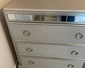 P11 - $150. 6 Drawer Dresser in Silver with mirror accents. All drawers slide easily. No name. Measures 64" wide x 17" deep x 35.5" tall.