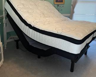P32 - $350. White Headboard with Adjustable Queen Bed. Frame & Mattress are from Ashley Furniture. Works great!