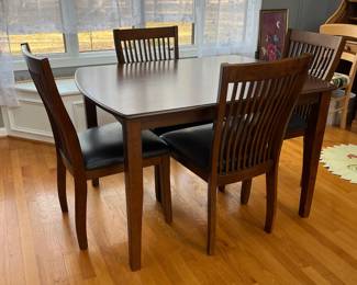 P84 - $125. Small Dining Table with 4 Chairs. Measures 48" x 36" x 30" tall. Chairs are 19" wide x 37" floor to top of back. 