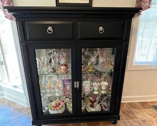 P22 - $275. Cute Display Cabinet / Storage Cabinet. Was used in the kitchen but very versatile piece! Measures 49.5” wide x 18” deep x 58.25” tall. Has 2 drawer that slide easily. Glass Shelves inside that are adjustable. 