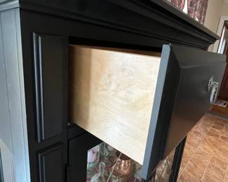 P22 - $275. Cute Display Cabinet / Storage Cabinet. Was used in the kitchen but very versatile piece! Measures 49.5” wide x 18” deep x 58.25” tall. Has 2 drawer that slide easily. Glass Shelves inside that are adjustable. 