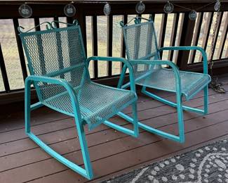 P5 - $400. Pair of Vintage Iron Rockers. Measures 21” wide x 25” deep x 32” tall. Have been painted a pretty blue. Structurally sound - very minor rust on the bottom of the rockers towards the back. Sturdy with mesh seat / back in very good condition! Have been on a covered screened porch. 