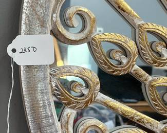 P35 - $35. Peacock Wall Mirror. Measures 23.5” diameter.