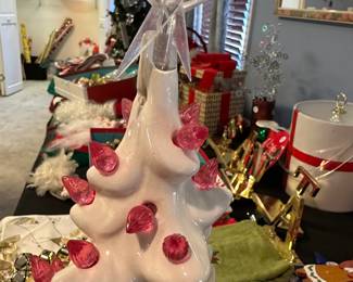 P73 - $50. Vintage White Ceramic Tree with Pink Ornaments. The top has a significant chip but if you place it towards the back it's not very noticeable. Star still stays in - See photo. 