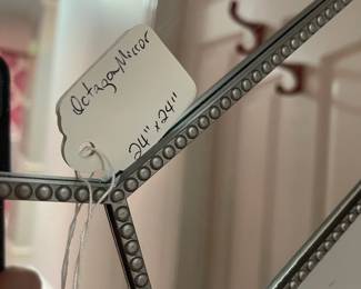 P27 - $30. Octagonal Wall Mirror. Measures 24” wide x 24” tall.