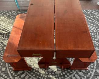 P8 - $100. Portable Table and Benches. Table top measures 37” wide x 26” deep. Benches measure 36” wide x 9.5” deep x 18” tall. Benches come apart and store inside table top along with the table legs. Made of Pine wood. 