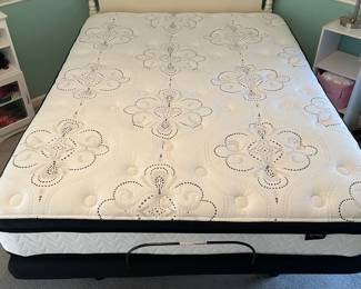 P32 - $350. White Headboard with Adjustable Queen Bed. Frame & Mattress are from Ashley Furniture. Works great!