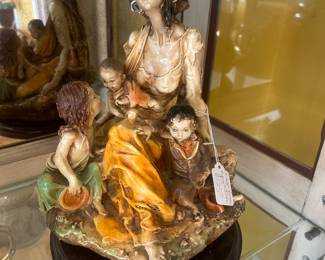 Giuseppe, Armani, gypsy and children figurine