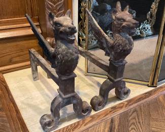 Early cast winged Griffin andirons