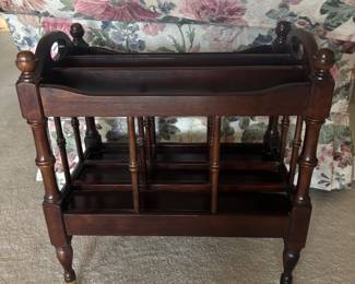 vintage mahogany Canterbury-style magazine rack featuring decorative brass castors in great condition. 