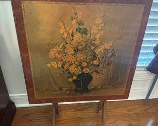vintage floral folding table featuring a print of a painting by artist Carle J. Blenner. 
