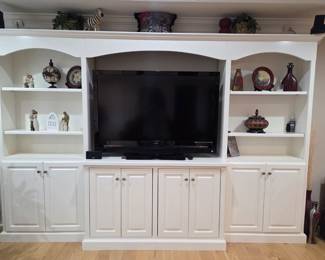 Built-in not available...only items on the shelves & TV