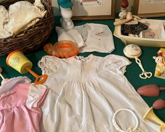 Baby clothes 
Celluloid baby rattles 