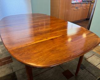 MCM Teak Extension Rounded Rectangular Dining Table with Hidden Leaf Storage (40"W x 28-1/2"H x 67-1/2"L with 2 - 15"L Additional Leaves) 