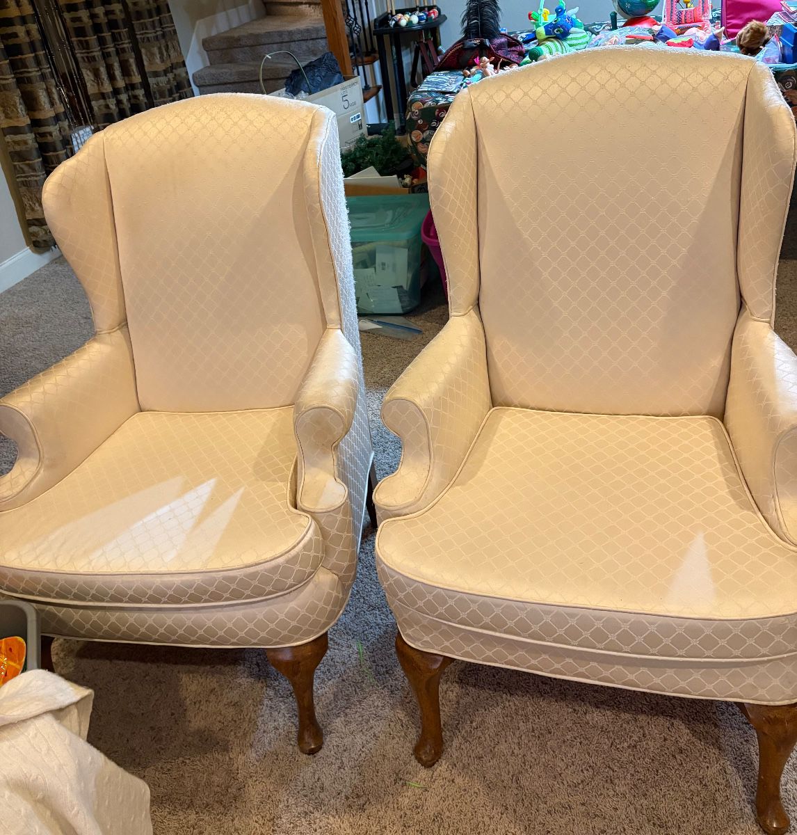 Ivory wingback chairs