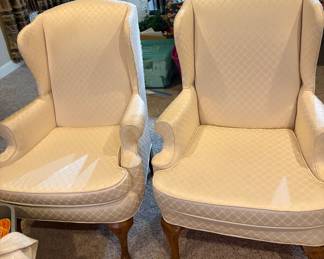 Ivory wingback chairs