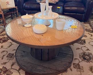 Leather couch, spool table, milk glass