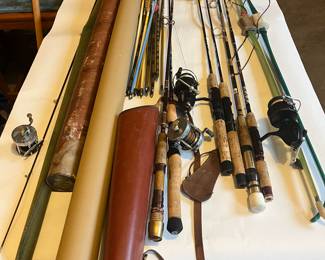 FISHING RODS & BOWS W/ ARROWS