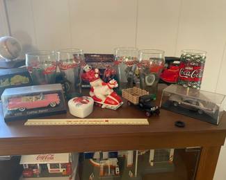 Coca-cola decor, Braves baseball w/ signatures , pink Cadillac and more