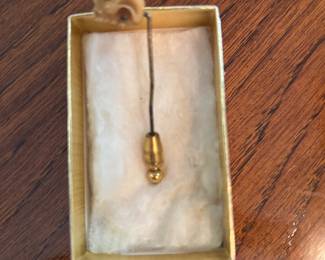 ANTIQUE CARVED SKULL STICK PIN PAT#13009 “HOLD ON”